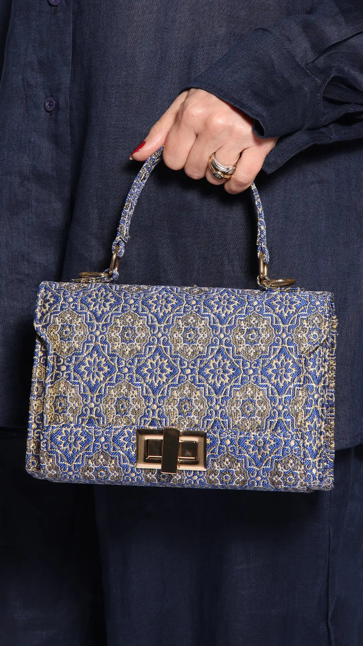 THE ZAHLE CLUTCH